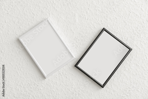 Photo frames on light wall