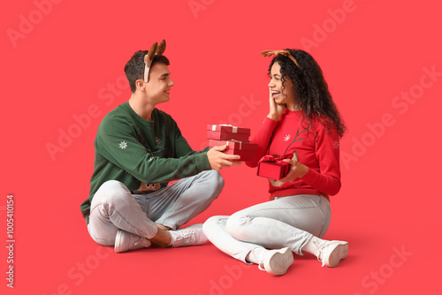 Young couple exchanging chr...