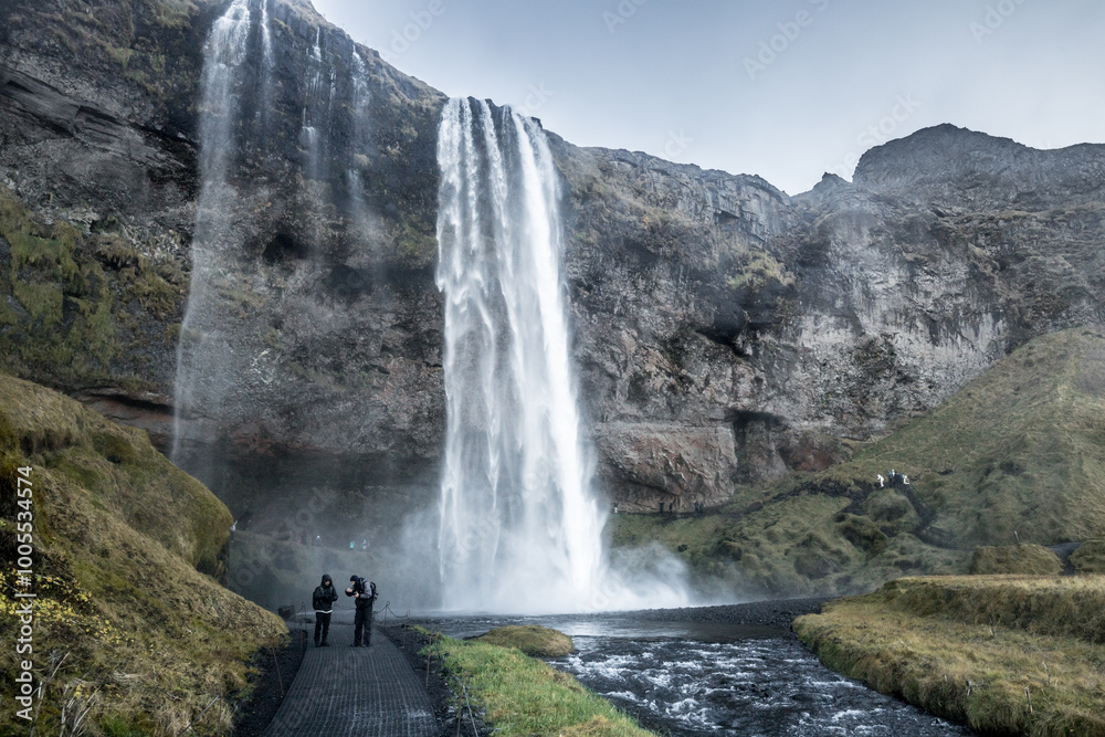 Fototapeta premium seljalandsfoss, waterfall, iceland, 60 meters, famous, path, tourist trail, attraction, viewpoint, golden circle