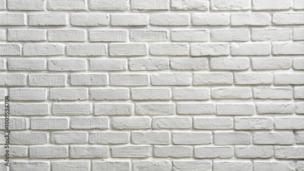 This clean white brick wall serves as a minimalist backdrop, perfect for modern design, textures, and creative This clean white brick wall serves as a minimalist backdrop, perfect for modern design, textures, and creative