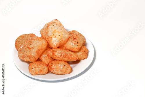 Kerupuk kulit (rambakjangekkrecekkarodok) are a traditional Indonesian snack made from cow or sheep skin, with a spicy taste.