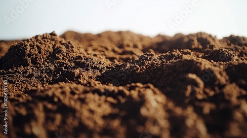 Close Up Of Moist Brown Fresh Soil on a White Background .generative ai