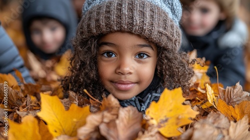 A child surrounded by autumn leaves, smiling joyfully with friends in the background.