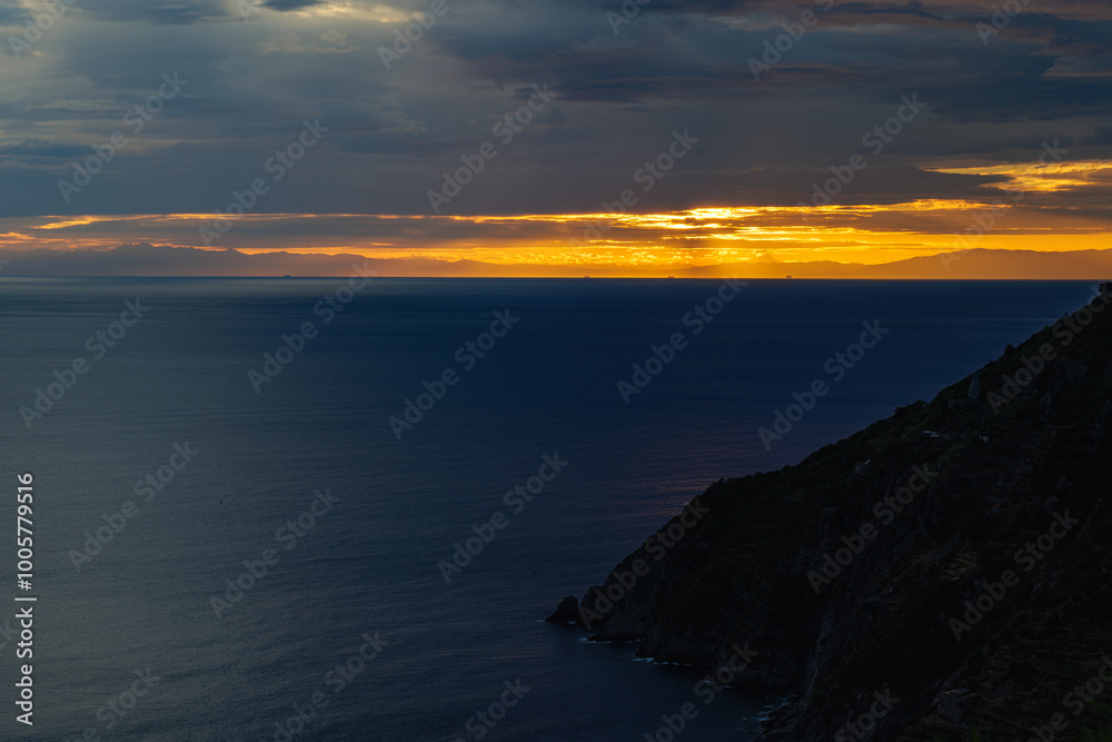 Fototapeta premium Incredible sunset over Ligurian Shore, Cinque Terre Manarola Italy