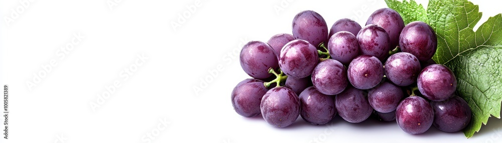 Fresh Purple Grapes with Green Leaves Isolated on White Background - High-Quality Stock Photo Fresh Purple Grapes with Green Leaves Isolated on White Background - High-Quality Stock Photo