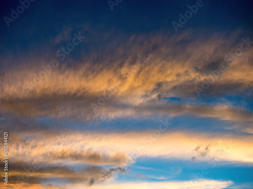 blue sky with clouds and sun, the sunset behind the clouds