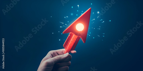 Innovative Launch: Hand Holding a Glowing Rocket