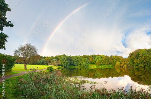 Rainbow over a city park in The Hague, Netherlands