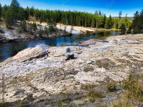 Mortar Geyser on the Firehole River in the Upper Geyser Basin in Yellowstone National Park in Wyoming. photo