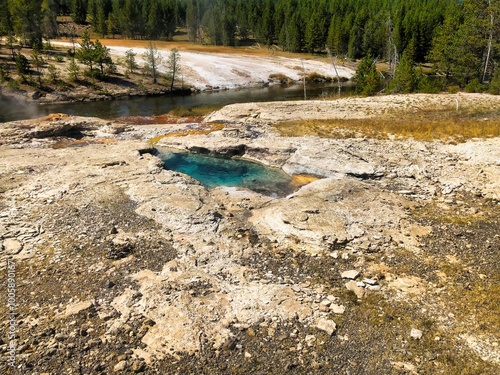 Spiteful Geyser Along the Firehole River in the Upper Geyser Basin in Yellowstone National Park in Wyoming. photo