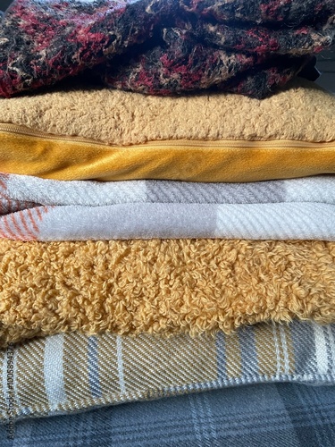 stack of blue and yellow fabric background