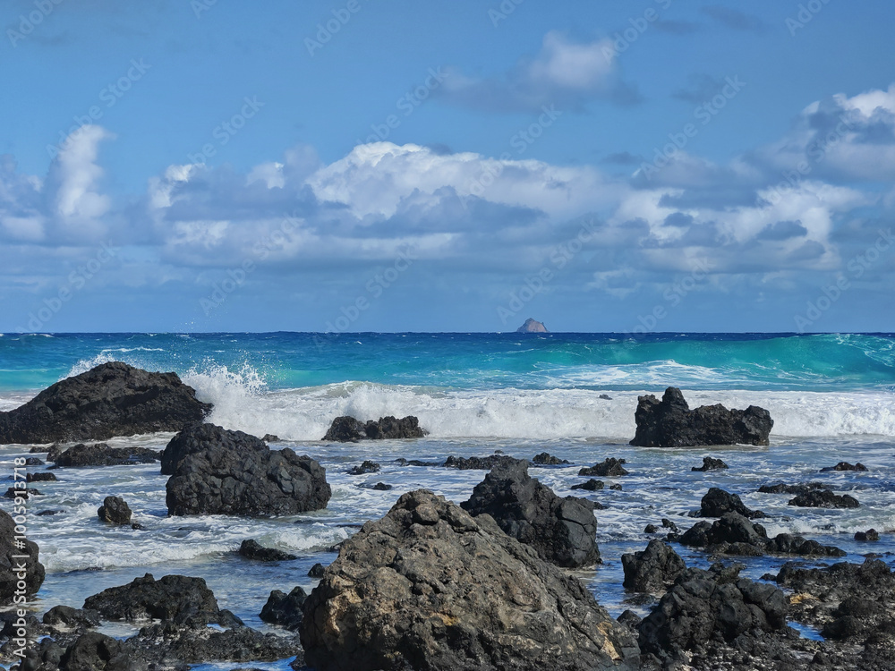 Caleta del Mojon beach with white sand and volcanic rocks in Lanzarote, Spain Caleta del Mojon beach with white sand and volcanic rocks in Lanzarote, Spain