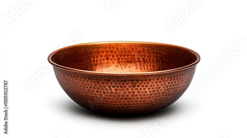 Copper bowl with a unique hammered texture, perfect for cooking, serving, or decorative purposes in modern kitchens.