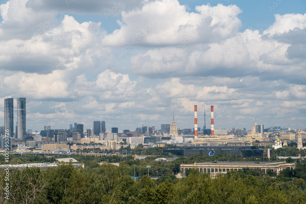 Visitors at Luzhniki Park enjoy stunning views of Moscow City is skyline, showcasing a mix of contemporary architecture and historical sites Visitors at Luzhniki Park enjoy stunning views of Moscow City is skyline, showcasing a mix of contemporary architecture and historical sites