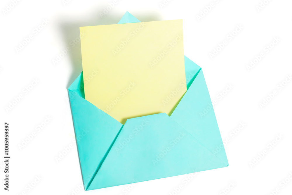 Top view of open blue envelope with yellow paper sheet isolated on white background. Top view of open blue envelope with yellow paper sheet isolated on white background.
