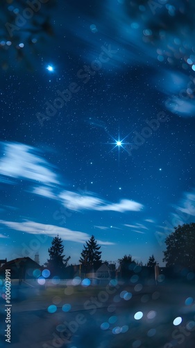 night landscape with moon and stars wallpaper - Night sky filled with stars and clouds over a quiet landscape under a serene blue atmosphere at twilight