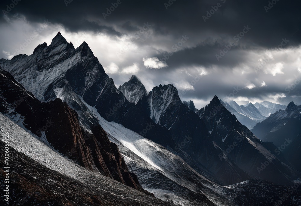 Obraz premium expansive mountain range beneath turbulent storm clouds showcasing majestic natural beauty, scenery, landscape, peak, nature, wilderness, elevation