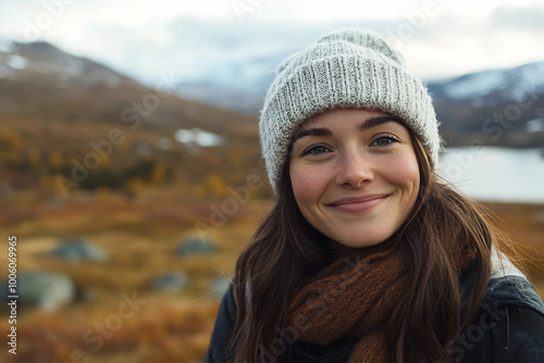 Solo traveler with map exploring autumn mountains on a misty day generative AI image