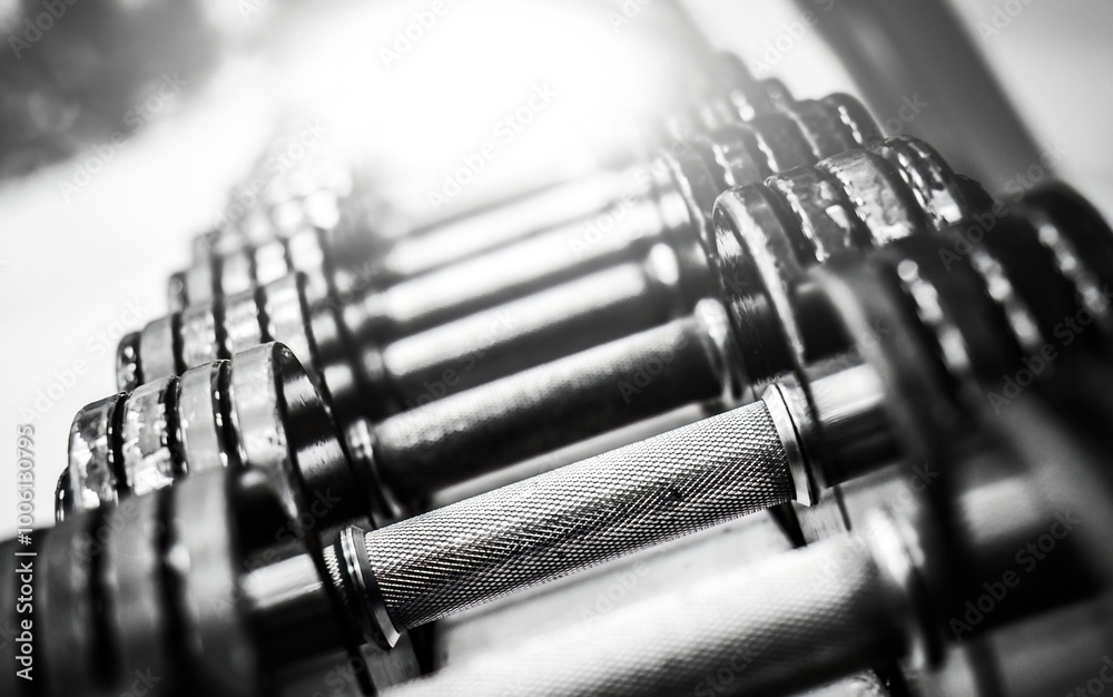 metallic dumbbells in a row metallic dumbbells in a row