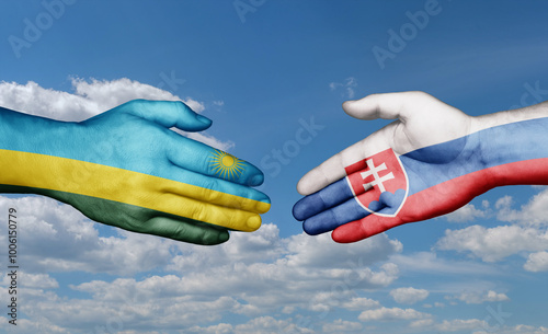 Photography Slovak Republic or Slovakia and Rwanda country handshaking with flags, consensus