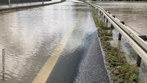 Wallpaper Mural Flooded and impassable national road DK1 due to pool of water at confluence of Rivers Wapienica i Iłownica during flood in September 2024 in Poland in Czechowice Dziedzice - slow motion. Torontodigital.ca