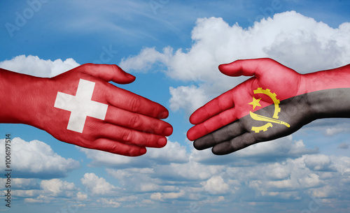 Switzerland and Angola country handshaking with flags, consensus concept international co-operation illustration