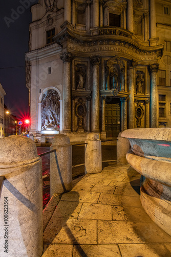 At night in the streets of the Eternal City. Streets, alleys and old buildings from Roman times with great lighting and light installations. Blue hour of an urban metropolis, no people, Rome, Italy photo