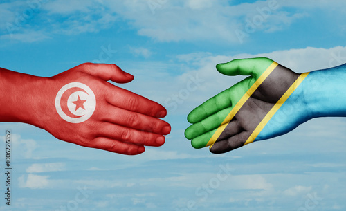 Tanzania and Tunisia country handshaking with flags, consensus concept international co-operation illustration photo