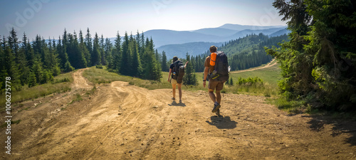 Two people are hiking with backpacks in the mountains.