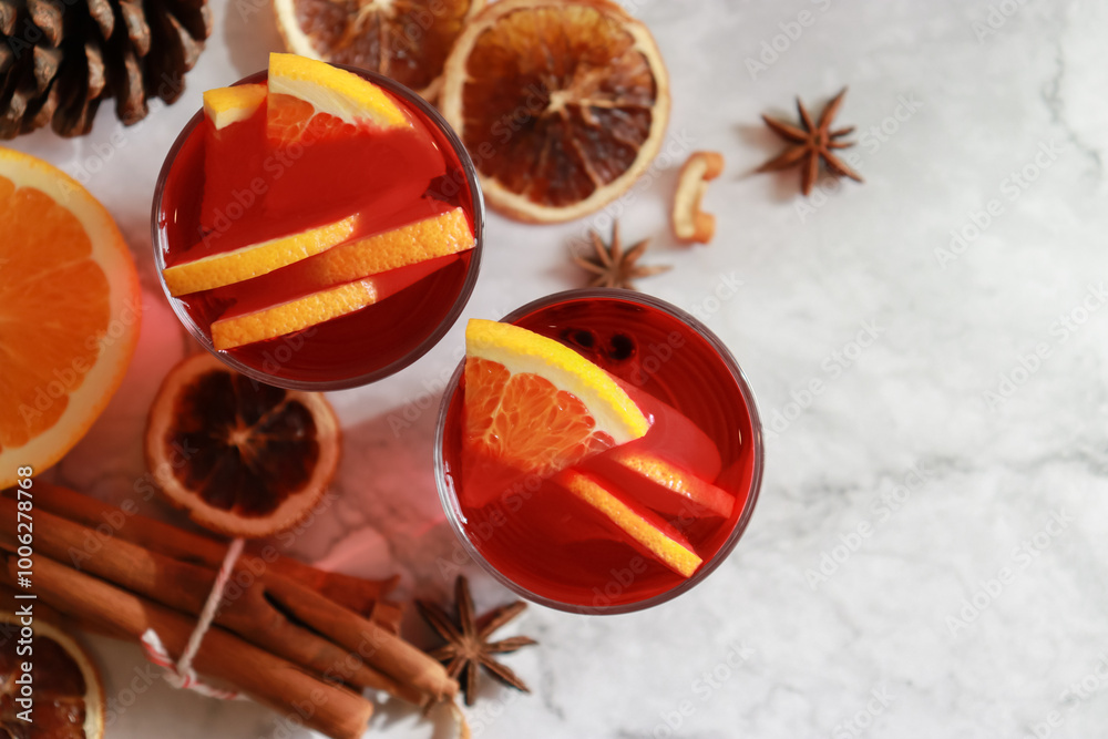 Mulled wine with fresh orange sliced. Traditional hot drink in Christmas time. Mulled wine with fresh orange sliced. Traditional hot drink in Christmas time.