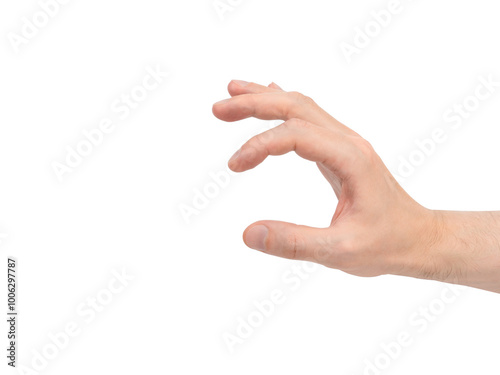 A man's hand holding something small isolated on a white background.