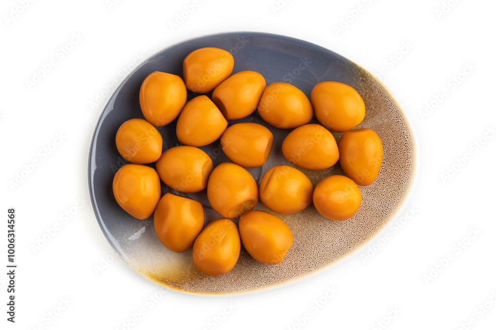 Pile of Smoked Quail eggs isolated on white, top view, close up. Pile of Smoked Quail eggs isolated on white, top view, close up.