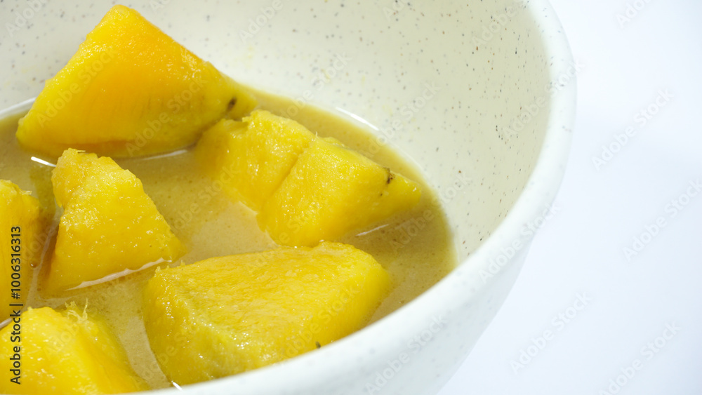 Traditional Indonesian Dessert 'Kolak' on White Background Traditional Indonesian Dessert 'Kolak' on White Background