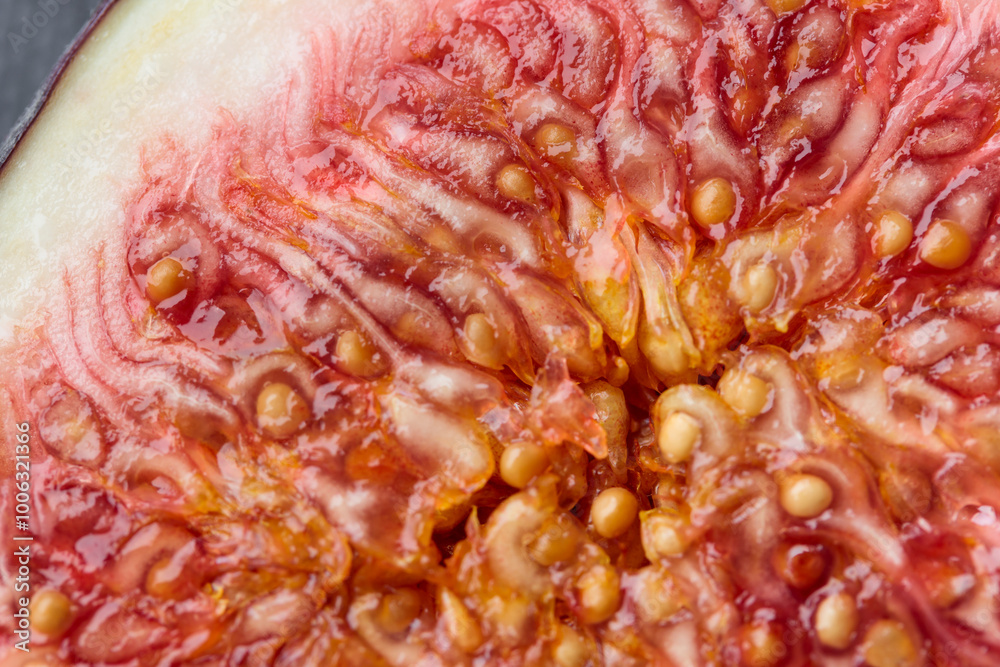 Fresh cutted fig colorful background, flat lay, top view, macro tropical fruits texture Fresh cutted fig colorful background, flat lay, top view, macro tropical fruits texture