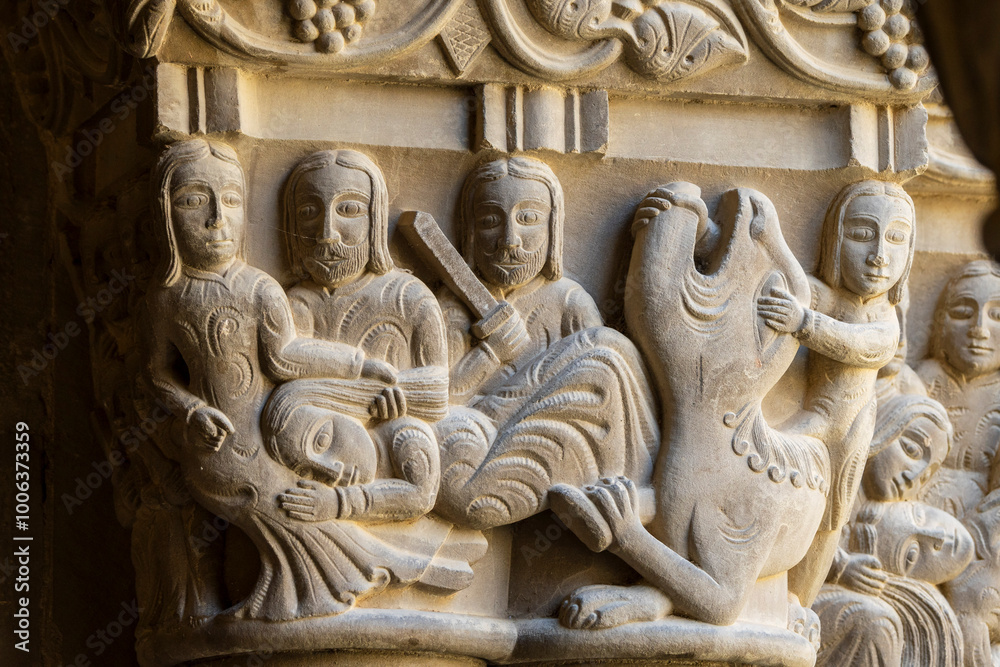 Knights fighting monsters and rescuing a maiden, Romanesque capital in the cloister, San Pedro el Viejo Monastery, Huesca, Aragon community, Spain Knights fighting monsters and rescuing a maiden, Romanesque capital in the cloister, San Pedro el Viejo Monastery, Huesca, Aragon community, Spain