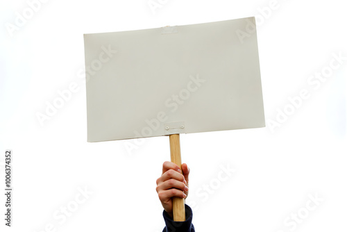 A person's hand holding a blank sign on wooden stick, copy space for text, graphic, image placement, isolated on white background. Protester lifting a signboard during a union strike, street protest.