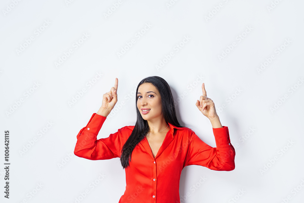 business woman points his fingers upwards isolated on white background with copyspace. business woman points his fingers upwards isolated on white background with copyspace.