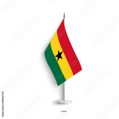 Ghana table flag on light grey background. Ghana desk flag isolated on grey background photo