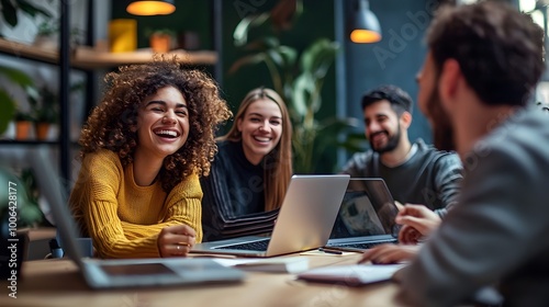 Diverse Group of Young Students or Professionals Collaborating in Modern Workspace
