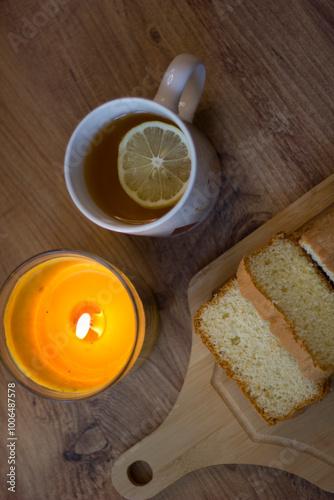 cake with lemon tea. Autumn evening.