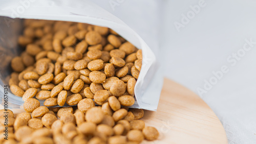 Close-up of Pet Food Kibble Spilling from Bag