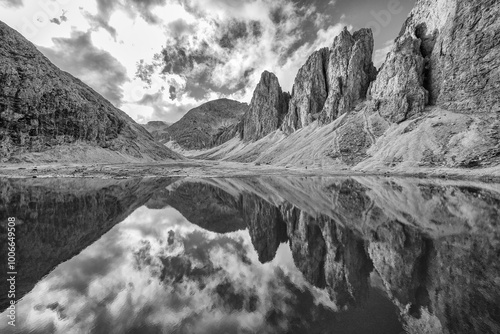 Antermoia  lake, a glacial lake in Antermoia valley, Dolomites, South Tyrol, Italy photo