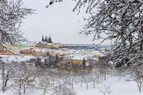 Obraz na płótnie Snowy Prague City with gothic Castle from the Hill Petrin, Czech republic w salonie