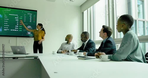 Wallpaper Mural Female CEO giving a Presentation to Employees in a Conference room Torontodigital.ca