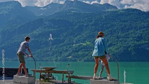 Children's playground with a modern approach to child development, with incredible views of the Alps and Lake Interlaken on the promenade of Brientz Switzerland photo