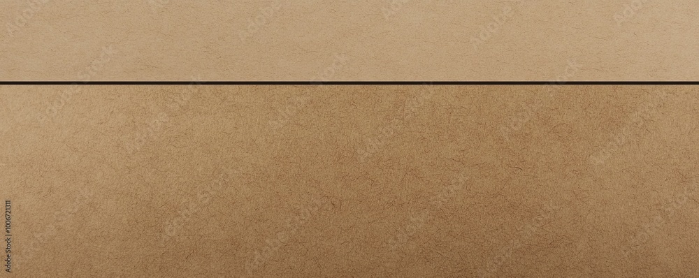 A close-up shot of a light brown cardboard surface with a thin black line separating two tones of brown. A close-up shot of a light brown cardboard surface with a thin black line separating two tones of brown.
