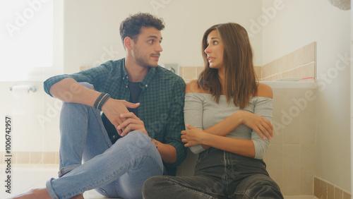 Tableau sur toile Couple Waiting Anxiously For Result Of Home Pregnancy Test In Bathroom