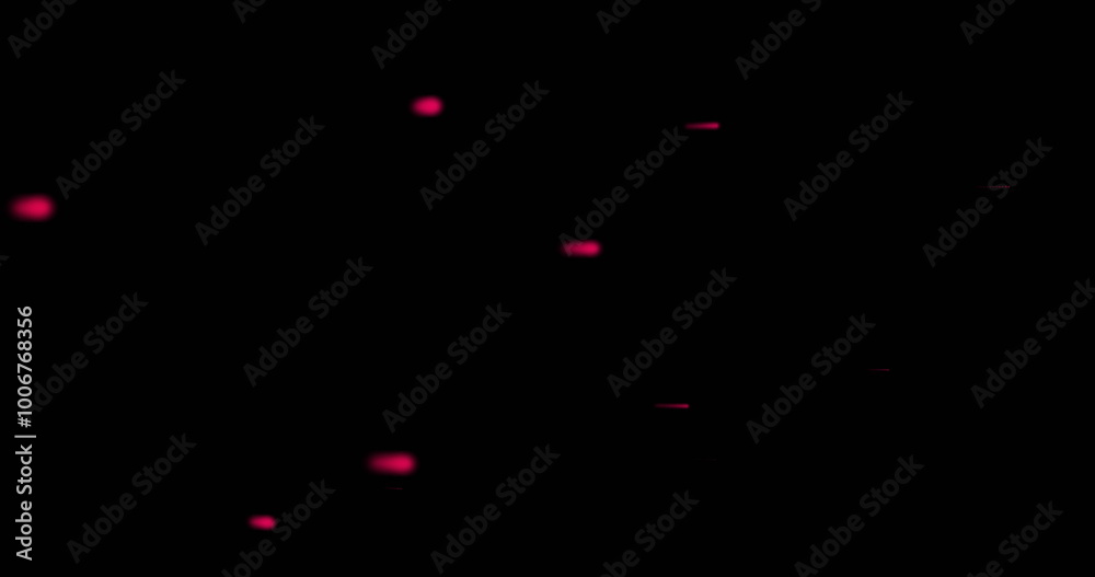 Image of glowing red light trails moving over black background