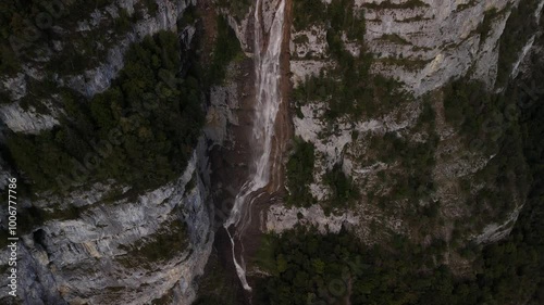 Swiss Alps mountains waterfall Seerenbach Falls in AMden region scenic view photo