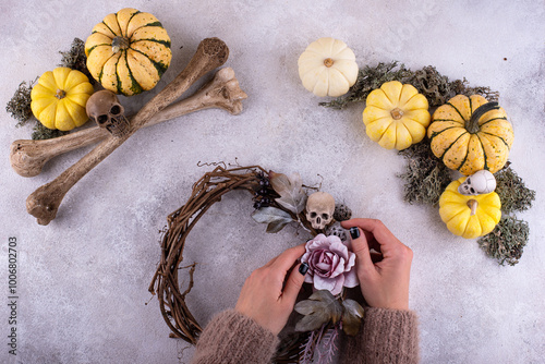 Process of making Halloween wreath. photo